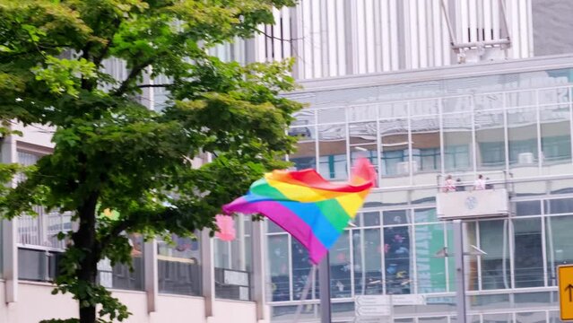 rainbowflag, fight for sexual diversity, participants of international LGBT movement, Gay pride parade in city with rainbow flags, against discrimination and attacks on queer people