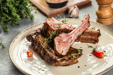 grilled lamb rib chop steaks, medium rare. Restaurant menu, dieting, cookbook recipe top view