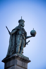 Fototapeta na wymiar A bronze statue of the Habsburg Emperor Leopold I in Trieste. Italy