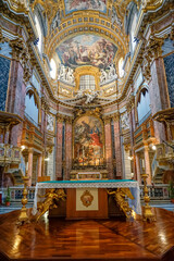 Fototapeta na wymiar side altar of the chapel inside the basilica SS Ambrogio e Carlo in the center of the Italian city of Rome