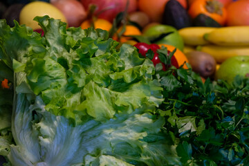 Lettuce, vegetables, herbs, and fruits background.