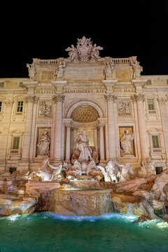 front and center image of the Trevi Fountain at night. City of Rome, Italy