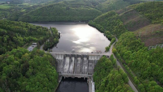 Slapy Reservoir is dam on the Vltava river in the Czech Republic, near to village Slapy. It has a hydroeletrics power station included.Aerial panorama landscape photo view	

