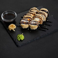 Baked sushi. Asian cuisine. Japanese snacks.