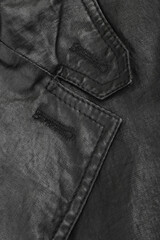 clothing details and decorative elements, pockets and seams, black fabric, textiles