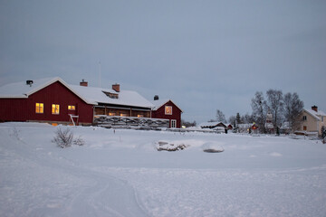 JUKKASJARVI, SWEDEN - NOVEMBER 26 2023: Christmas market in the old village near Kiruna in Jukkasjarvi.