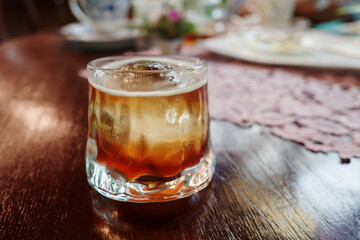 Chilled cold brew coffee on a Rustic Wooden Table