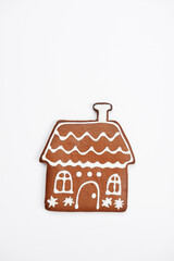 The hand-made eatable gingerbread house on white background - 686334149