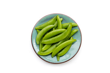 Fresh young green peas on white background.