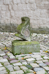 Wall console stone in front of the town church in Egeln, Saxony-Anhalt, Germany