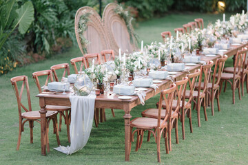 lovely Table setting for magnificent composition from flowers at a wedding , Centerpiece white and...