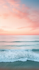 Capture the elegance of a minimalist seascape during sunset with a drone, showcasing the gentle waves and a pastel-colored sky, using a soft film style for a calming and sophisticated mobile wallpaper