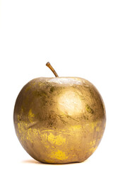 one golden apple isolated on white illustrate wealth and new beginning