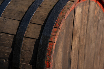 A wooden vine barrel on the sun