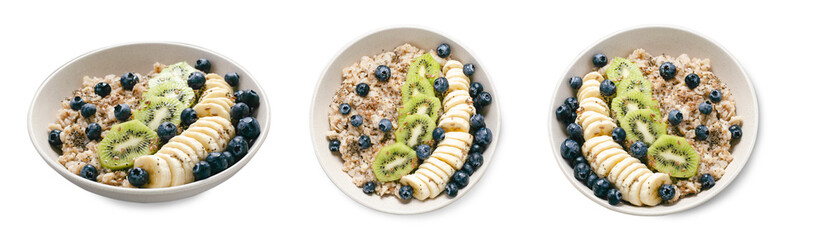 Oatmeal Bowl with Blueberry, Banana and Kiwi, Oat Porridge in a Bowl on White Background, Healthy Snack or Breakfast