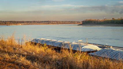 barges on the Mississippi River at confluence with the Ohio RIver below Cairo, IL, November scenery