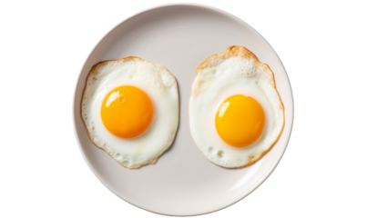 Two fried eggs on a grey plate. 