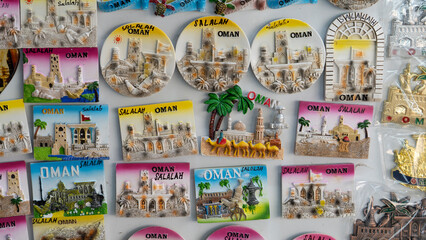 fridge magnets as souvenirs can be found at Al-Husn Souq in Salalah. - obrazy, fototapety, plakaty