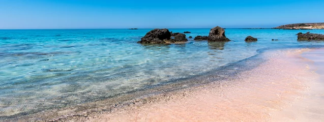 Tuinposter Elafonissi Strand, Kreta, Griekenland Banner of Beautiful view of Elafonisi Beach, Chania. The amazing pink beach of Crete. Elafonisi island is like paradise on earth with wonderful beach with pink coral and turquoise waters.