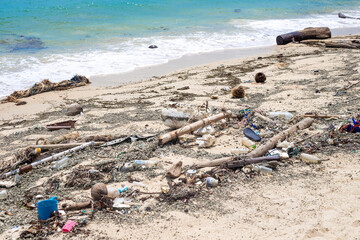 Garbage on the seashore. Dirty beach, environmental problem
