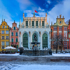Sunrise in the historic center of Gdansk at the Neptune Fountain, Poland