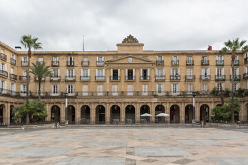 View of Plaza Barra or Plaza Nueva, a neoclassical square in the historic area of Casco Viejo, downtown Bilbao, Spain