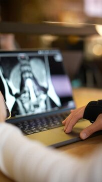 Laptop display of a student from a medical university, taking part in online coursework.