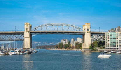 Vancouver's historic Burrard Bridge. Scenic view at Burrard Bridge from Granville Island, Vancouver, Canada.