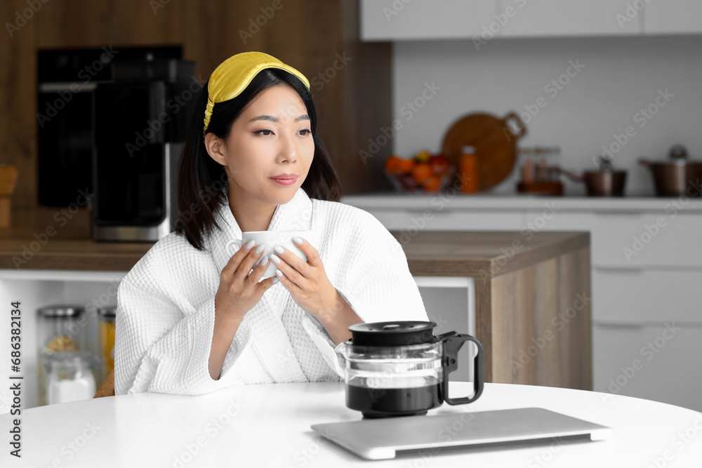 Canvas Prints beautiful asian woman with cup of hot coffee in kitchen