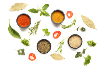 Composition with fresh aromatic spices and herbs on white background