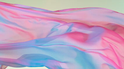 Pastel color transparent silk fabric flowing by wind,