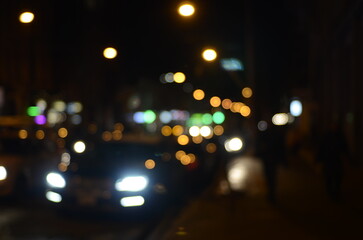Fototapeta na wymiar Blurred view of night city street