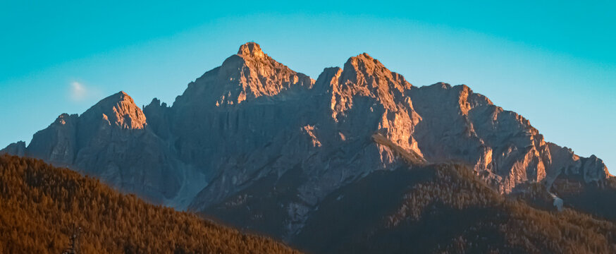 Alpine sunset or sundowner with Mount Serles and alpenglow at Stubaital valley, Innsbruck, Austria
