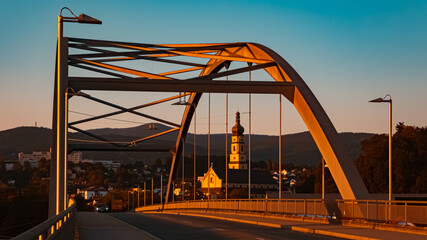 Sunset with a bridge and a church near Deggendorf, Danube, Bavaria, Germany