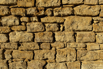Limestone mercantile wall in small-town Kansas.