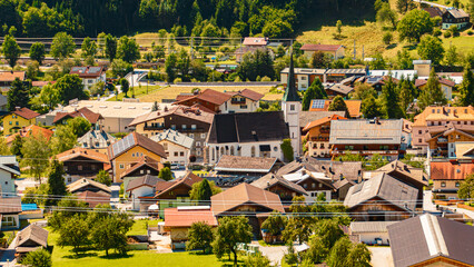 Aerial alpine summer view with a church at Dorfgastein, St. Johann im Pongau, Salzburg, Austria