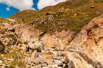 Alpine summer view with a mountain stream near Dresdnerhuette, Mutterbergalm, Stubaital valley, Innsbruck, Tyrol, Austria