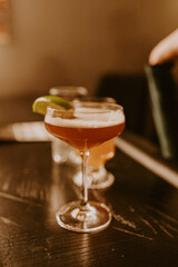 Martini in a glass with a lime