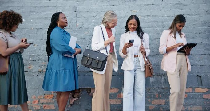 Women, diverse and job interview waiting conversation on cellphone in line, we are hiring and resume paper. Female people, together and recruitment outdoor queue or candidate, tablet or onboarding