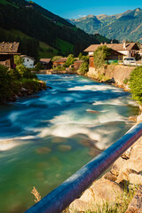 Alpine summer view with silky water effect at St Johann, San Giovanni, Ahrntal valley, Pustertal, Trentino, Bozen, South Tyrol