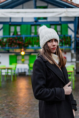 Caucasian tourist amid vibrant bokeh.