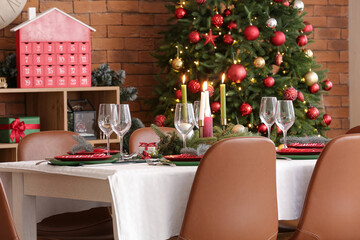 Festive table serving for Christmas celebration in dining room