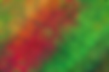Abstract blurred background image of red, yellow, green colors gradient used as an illustration. Designing posters or advertisements.