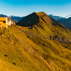 Alpine summer evening view with the famous touristic suspension bridge at Mount Stubnerkogl, Bad...