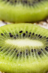 sliced ​​kiwi slices, macro photo, detail of vitamin C rich fruit