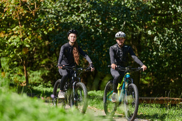 Fototapeta premium A blissful couple, adorned in professional cycling gear, enjoys a romantic bicycle ride through a park, surrounded by modern natural attractions, radiating love and happiness