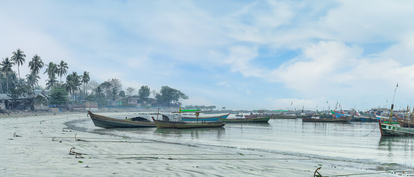 Wooden fishing boats at a village on Ngapali Beach