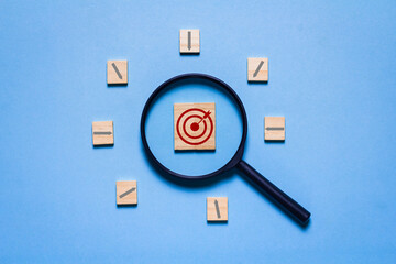 Red dart board icon and white arrow linked with human icon for target group, organizational...