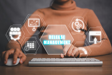 Release management concept, Business woman using computer on desk with release management icon on...