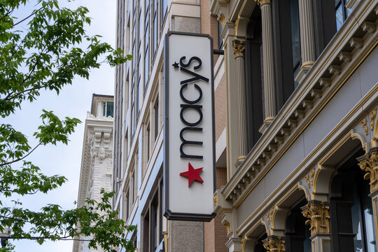 A Macy's store sign on the building at City Creek Center in Salt Lake City, Utah, USA,  on May 12, 2023. Macy's is an American chain of high-end department stores.